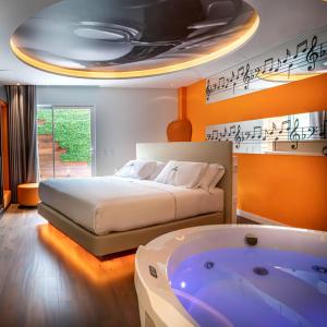 Tempat tidur dalam kamar di Hotel Avenue - Lovely hotel