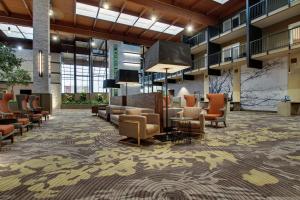 a lobby with chairs and a waiting room at Doubletree By Hilton Mt. Vernon in Mount Vernon