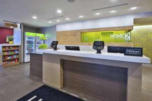 a lobby of a home store at Home2 Suites By Hilton Holland in Holland