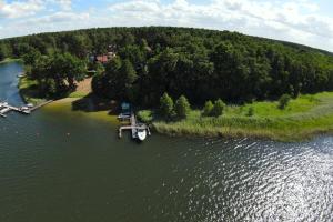 an aerial view of a small island in a lake at Villa-Pälitzsee in Rheinsberg