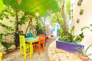 En hage utenfor "Vainilla B&B" - Stylish Comfort in Playa del Carmen