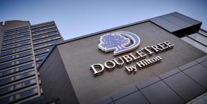 a sign on the top of a building at DoubleTree by Hilton Windsor, ON in Windsor