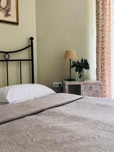 Cama ou camas em um quarto em Villa Toscana