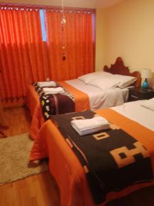 hostal ollantaytambo apartments 객실 침대