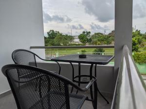 Hermoso departamento en Cancún YaxBahia 3 में एक बालकनी या छत