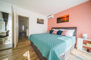 Krevet ili kreveti u jedinici u okviru objekta Sunset Apartment