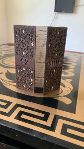 two books sitting on top of a table at 62hills hotel ayubia in Ayubia