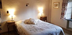 Cama ou camas em um quarto em B&B Le Moulin de Resteigne