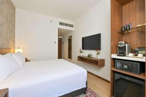 Кровать или кровати в номере Comfort Hotel Riyadh Olaya