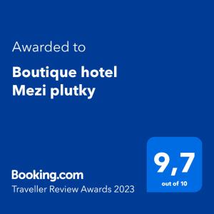 Un certificado, premio, cartel u otro documento en Boutique hotel Mezi plutky