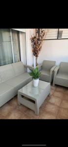 Uma área de estar em Appartement Résidence Palm Lake Monastir