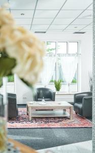 A seating area at Apart Business Hotel