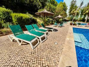 A piscina localizada em Casa Bibi, Sea&Sand - Praia da Rocha ou nos arredores