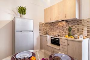 A kitchen or kitchenette at Oceanida kimw room