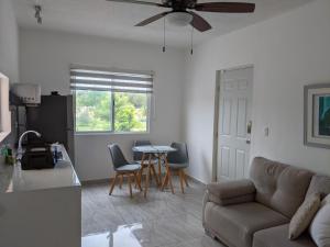 Hermoso departamento en Cancún YaxBahia 3 पर बैठने की जगह