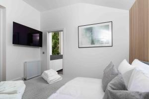 Et tv og/eller underholdning på Stunning new fully renovated flat in Marazion