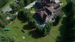 an overhead view of a large house with a yard at DW Janosik in Muszyna