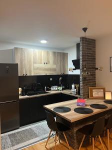 Kuhinja ili čajna kuhinja u objektu Loft Luxury Apartment