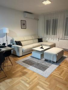 Prostor za sedenje u objektu Loft Luxury Apartment