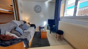 Zona d'estar a Spacieux appartement Tignes le Lac