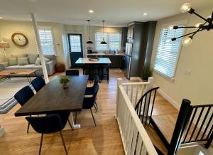 a dining room and living room with a table and chairs at 10 Fair H in Newport