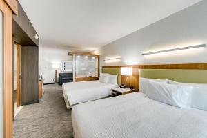 Posteľ alebo postele v izbe v ubytovaní SpringHill Suites by Marriott Houston The Woodlands