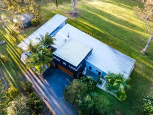 an overhead view of a building with a swimming pool at Springbank House in Jindy Andy