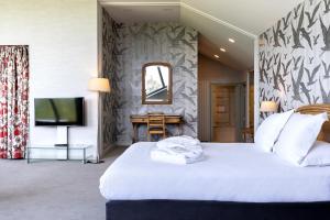 Cama ou camas em um quarto em Le Relais Saint Michel