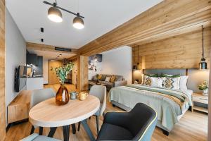 Tatra Nest Apartamenty - jacuzzi, sauna!房間的床