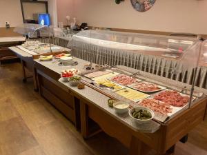 a buffet line with many different types of food at Safir Hotel Casino in Sežana