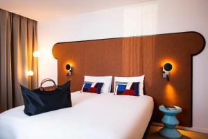 Кровать или кровати в номере Mercure Dunkerque Centre Gare