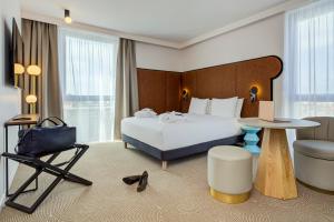 Кровать или кровати в номере Mercure Dunkerque Centre Gare