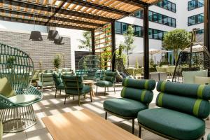 Khu vực ghế ngồi tại Motel One Stuttgart-Hauptbahnhof