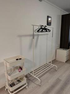 a shelf in a room with a white wall at A pie de PLAYA in La Pineda