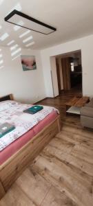 Ліжко або ліжка в номері Apartmán Kristýna