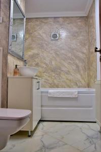 Apartament ILEV tesisinde bir banyo