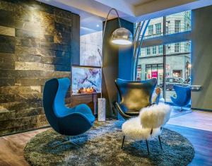 Khu vực ghế ngồi tại Motel One Manchester-Royal Exchange