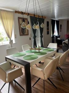 A seating area at Luxury Apartment near Munich Airport - Therme ED - Parking