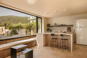 A kitchen or kitchenette at Home By The Sea