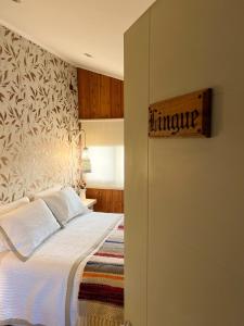 Cama ou camas em um quarto em Hotel Boutique Casa&Alma