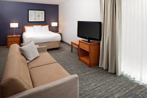 A television and/or entertainment centre at Residence Inn Lexington North