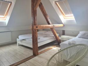 Ліжко або ліжка в номері AZUR ROOMS LJUBLJANA