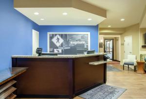 a lobby with a sign on the wall at Hampton Inn Merrillville in Merrillville