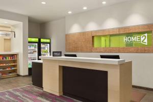 Ett certifikat, pris eller annat dokument som visas upp på Home2 Suites By Hilton Colorado Springs South, Co