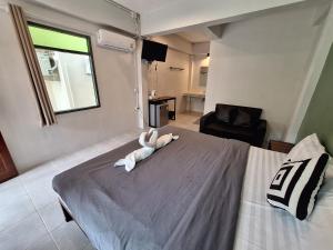 Tempat tidur dalam kamar di Sleep Pai Bed & Breakfast