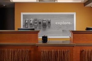 a black and white picture of remotes on a wall at Hampton Inn Alamogordo in Alamogordo