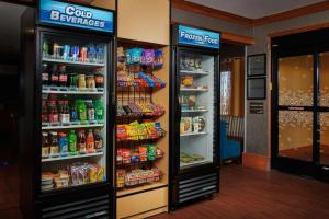 a store with two refrigerators with food and drinks at Hampton Inn Alamogordo in Alamogordo