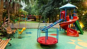 Zona de juegos para niños en Hare Krishna Home Stay