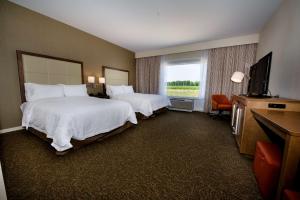 Krevet ili kreveti u jedinici u okviru objekta Hampton Inn & Suites Truro, NS