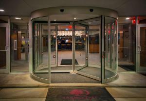 a revolving door in a building with a table at DoubleTree by Hilton Hotel Niagara Falls New York in Niagara Falls